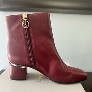 Franco Sarto L-Marquee booties. Size 8, gorgeous wine color. New, never worn.